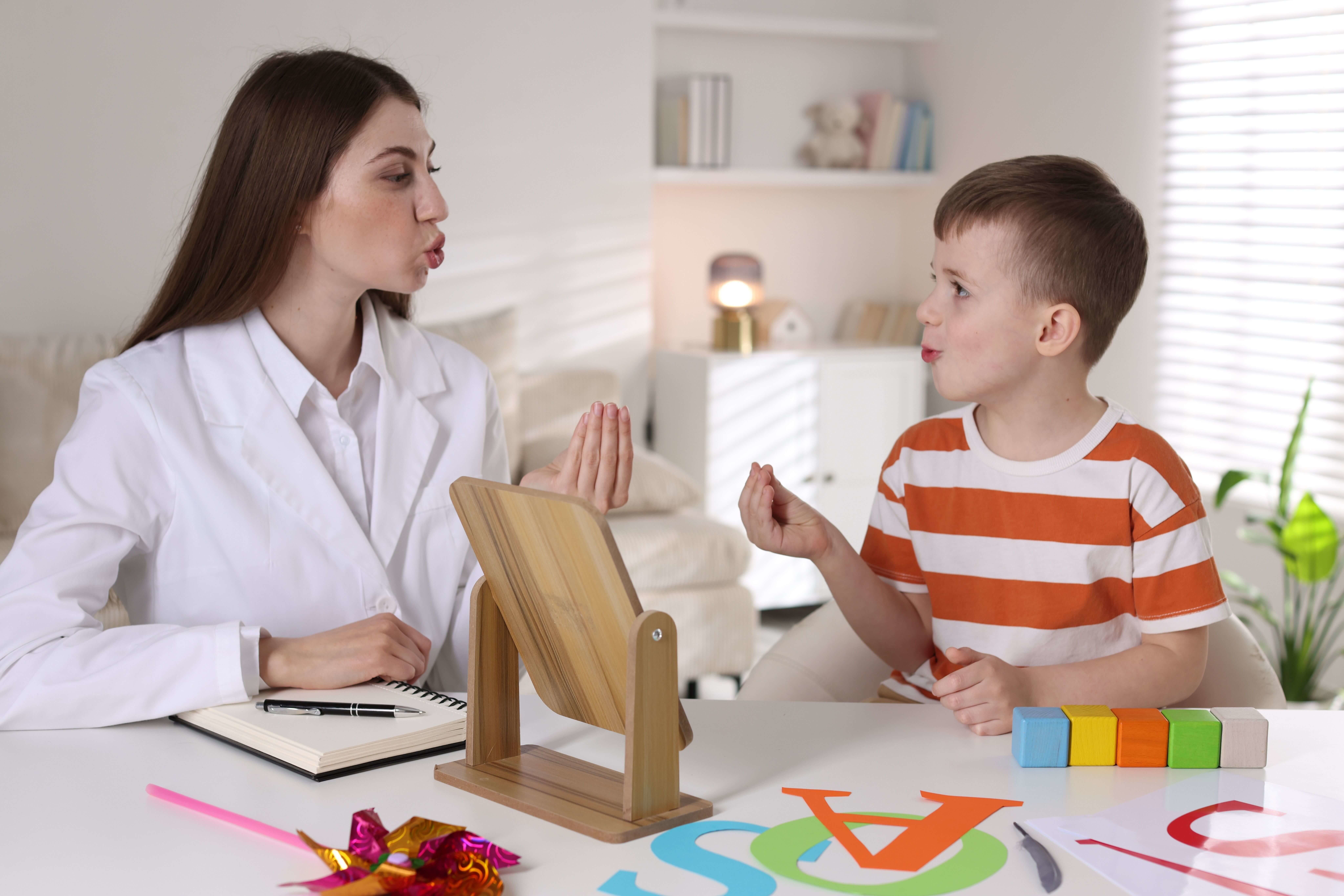 Speech pathologist providing articulation therapy to a child during a speech pathology Melbourne appointment